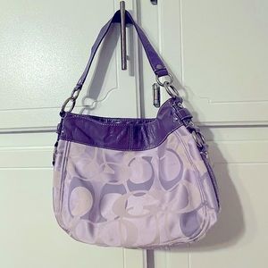Used Lilac colored Coach purse